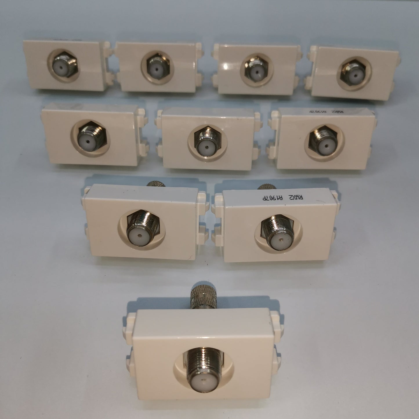 Set of Royu cable TV outlet connectors in white for electrical circuitry and parts