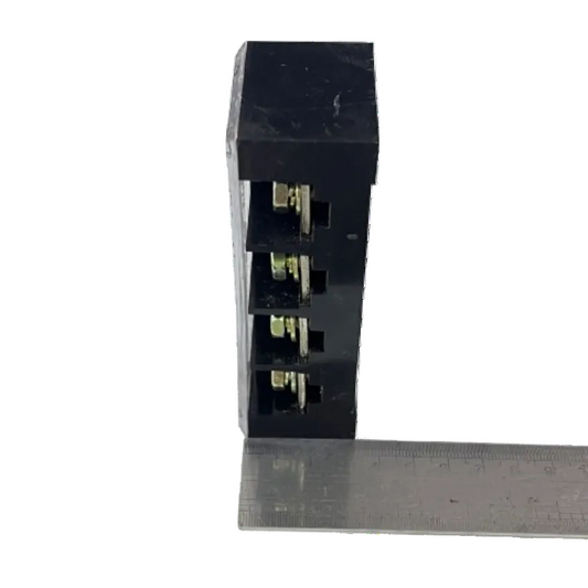 Grippes Sassin 100A 4 Pairs Terminal Block black plastic housing with brass screw terminals and ruler for scale