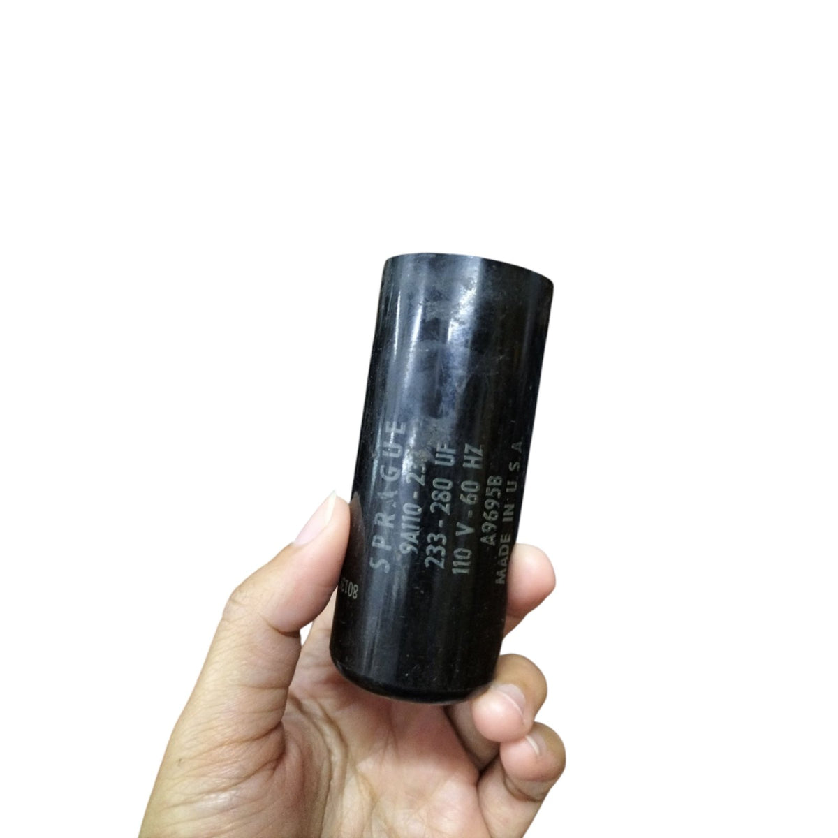 Philips Sprague Mallory Motor Starting Capacitor 233-280UF in a person's hand for fan repair