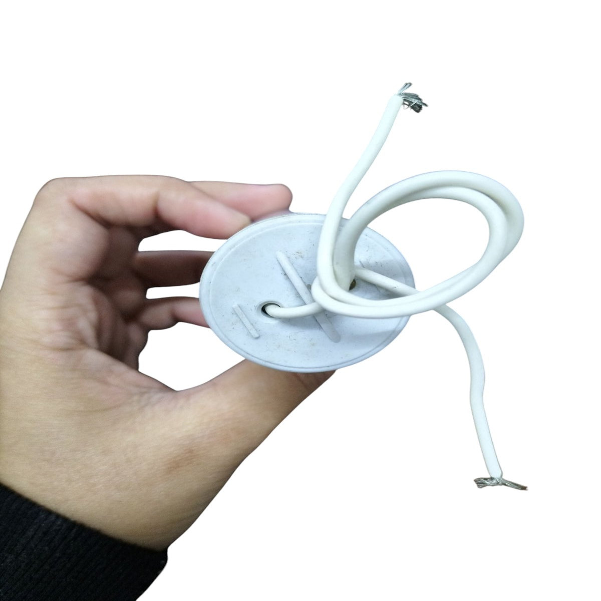 Syscap 14MFD 250 VAC Running Capacitor held in hand with connected wires