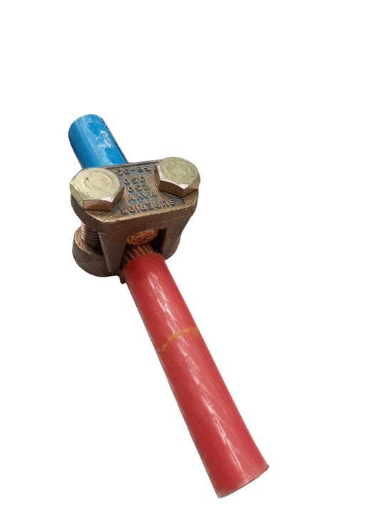 Solderless Connector 2 Bolt 250-350MCM securing red and blue electrical cables for circuitry connections