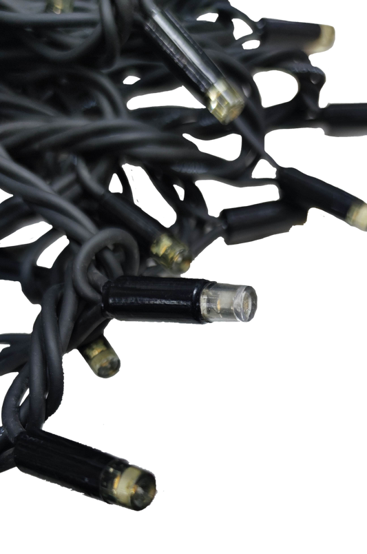 Close-up of weatherproof LED string lights 10 meters showcasing durable black wiring and bright bulbs