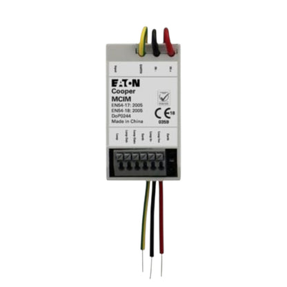 An Eaton Cooper MCIM electrical module with a white faceplate, black terminal block, and multicolored wire leads (yellow, red, black, green) on a plain white background.