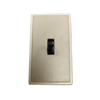 Kopez 1 Gang 1 Way Switch Toggle Type in beige with a textured surface for easy grip