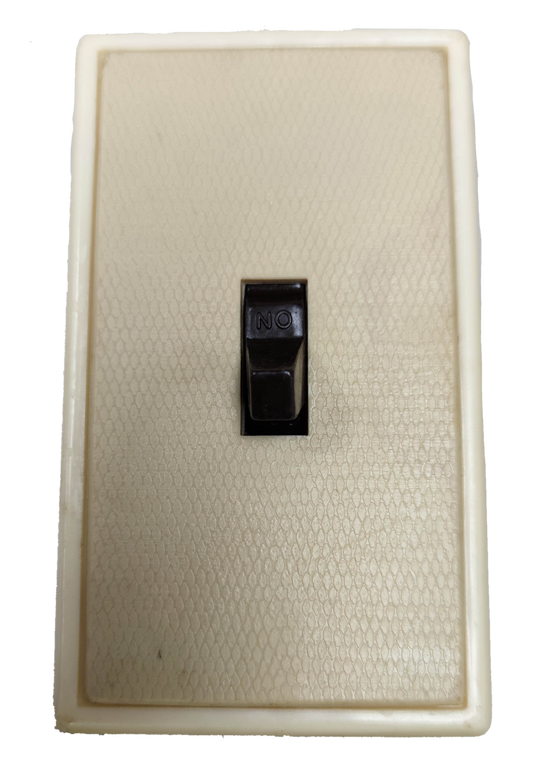 Kopez 1 Gang 1 Way Switch Toggle Type in beige with a textured surface for easy grip