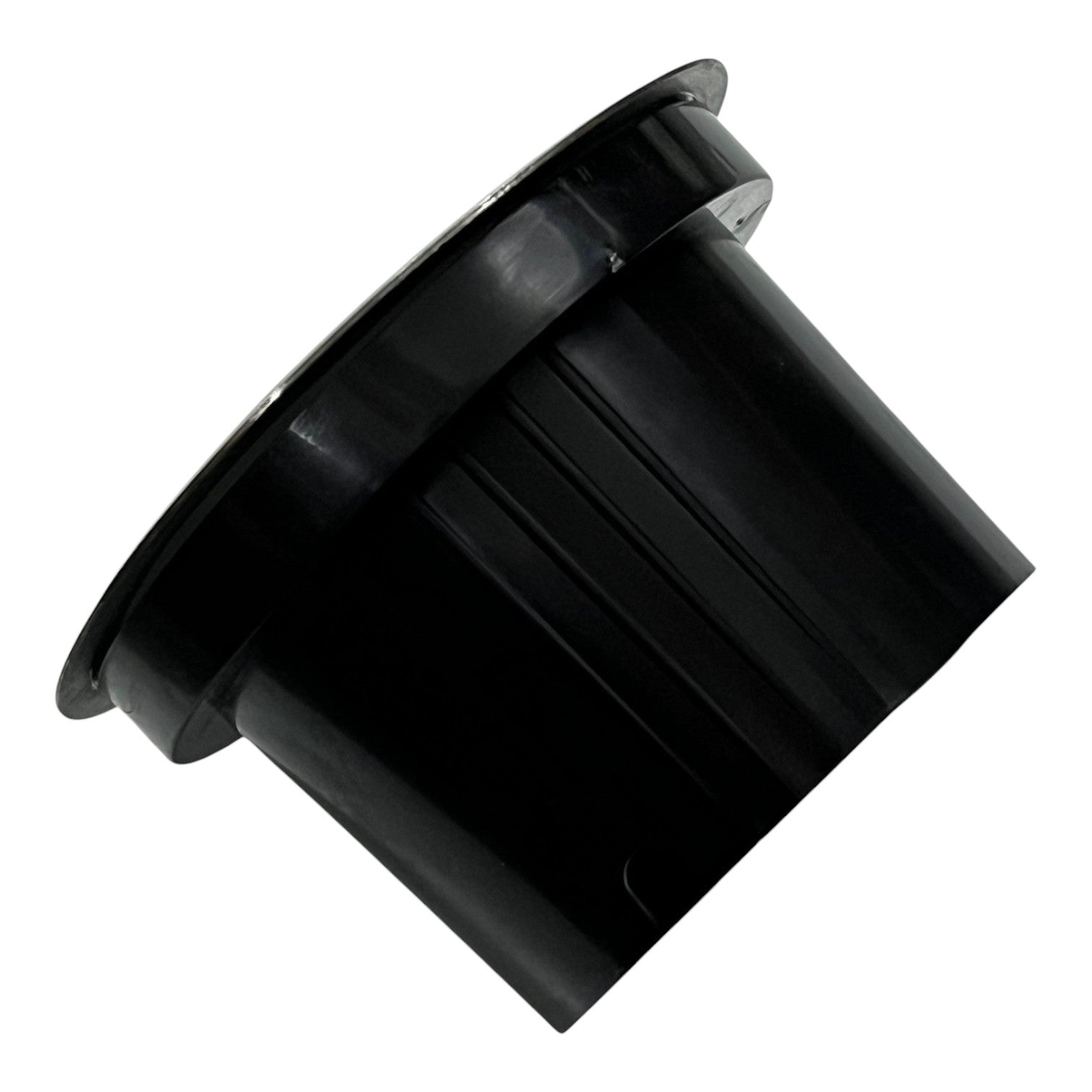 Black plastic component on a white background