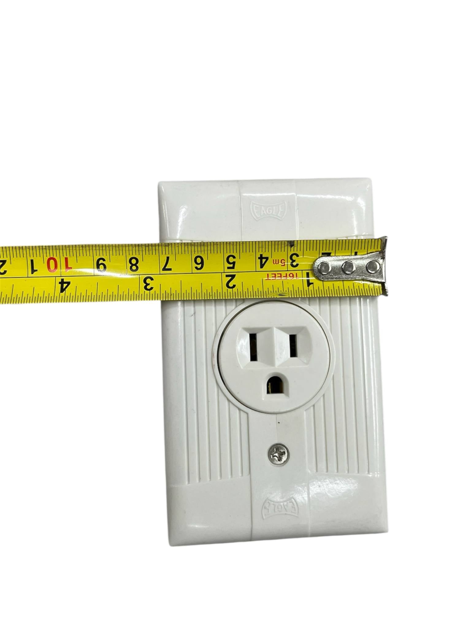 Eagle 15a 250v electrical outlet white with measurement tape for reference