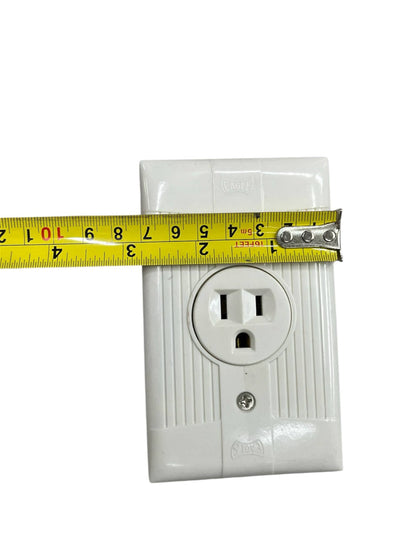 Eagle 15a 250v electrical outlet white with measurement tape for reference