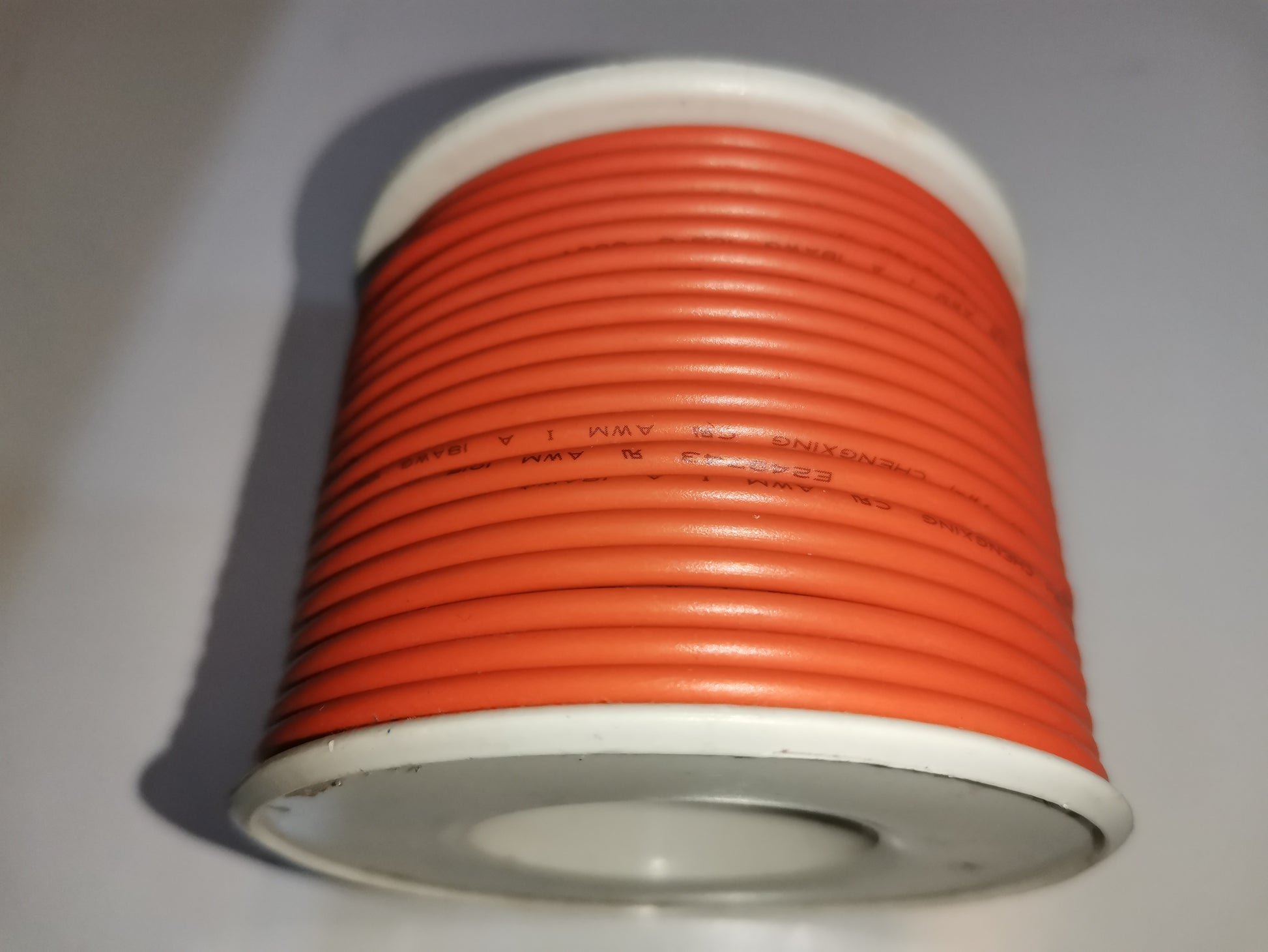 Grippes 18 AWG hook up wire orange spool for electrical connections and wiring projects