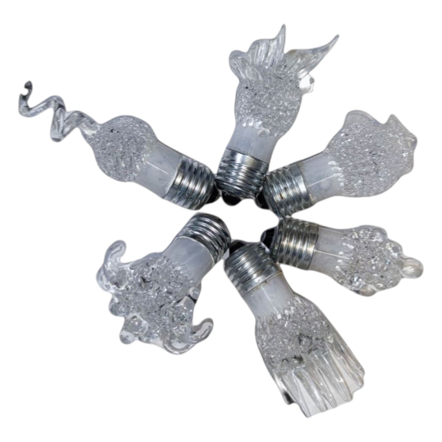 Decorative light bulbs with glittery finish arranged in a circular pattern on a white background.