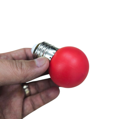 1W red LED ping pong bulb E27 held in hand, ideal for vibrant lighting and decorations