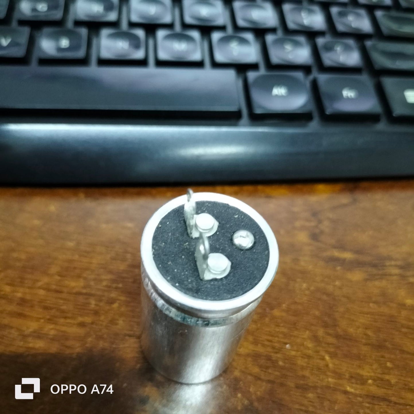 250V AC Capacitor Metal Casing with Two Connection Pins for Electrical Circuitry Applications