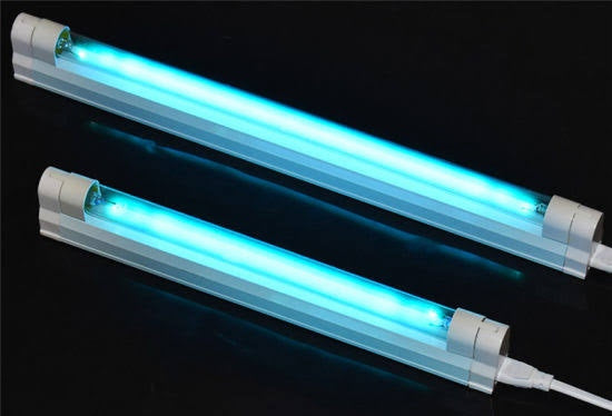 Two 28W T-5 UV-C Germicidal fluorescent tubes glowing blue with white end caps on black background