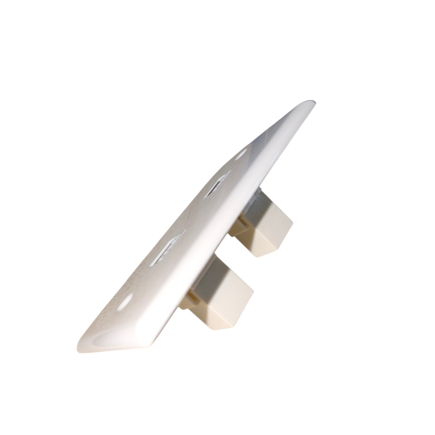 A white plastic or acrylic mounting bracket or cover with two small beige tabs, shown on a plain white background.