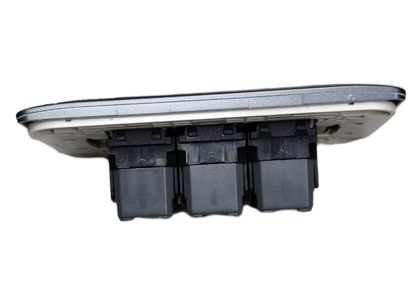 Omni 3 Gang 1 Way Switch with Plate showing back view with three black switch modules and white plate