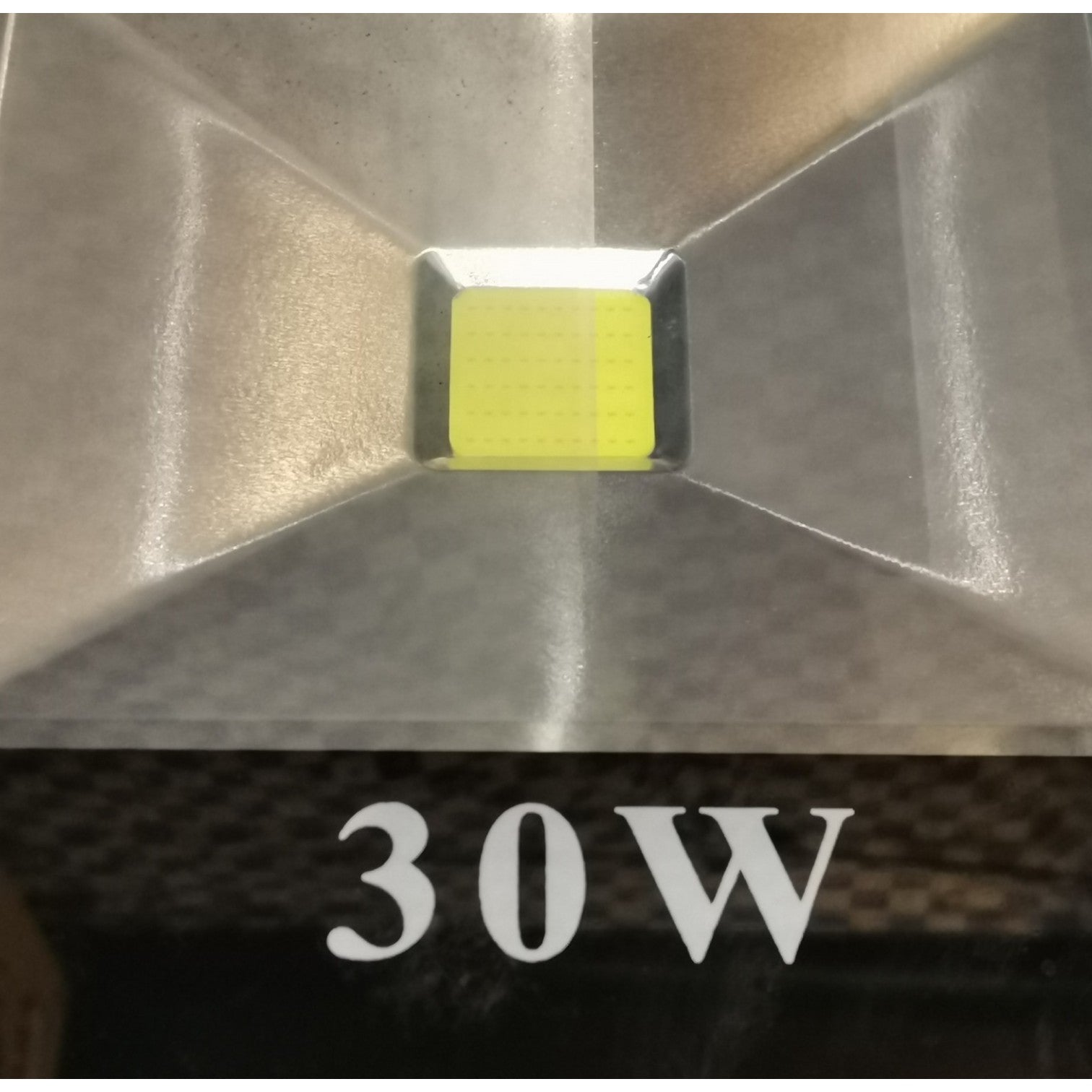 Metallic light fixture with '30W' label