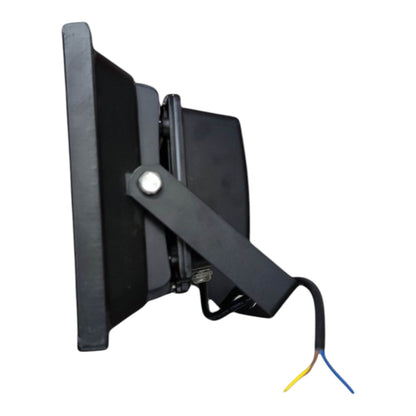 Black wall-mounted electronic device with wiring on a white background