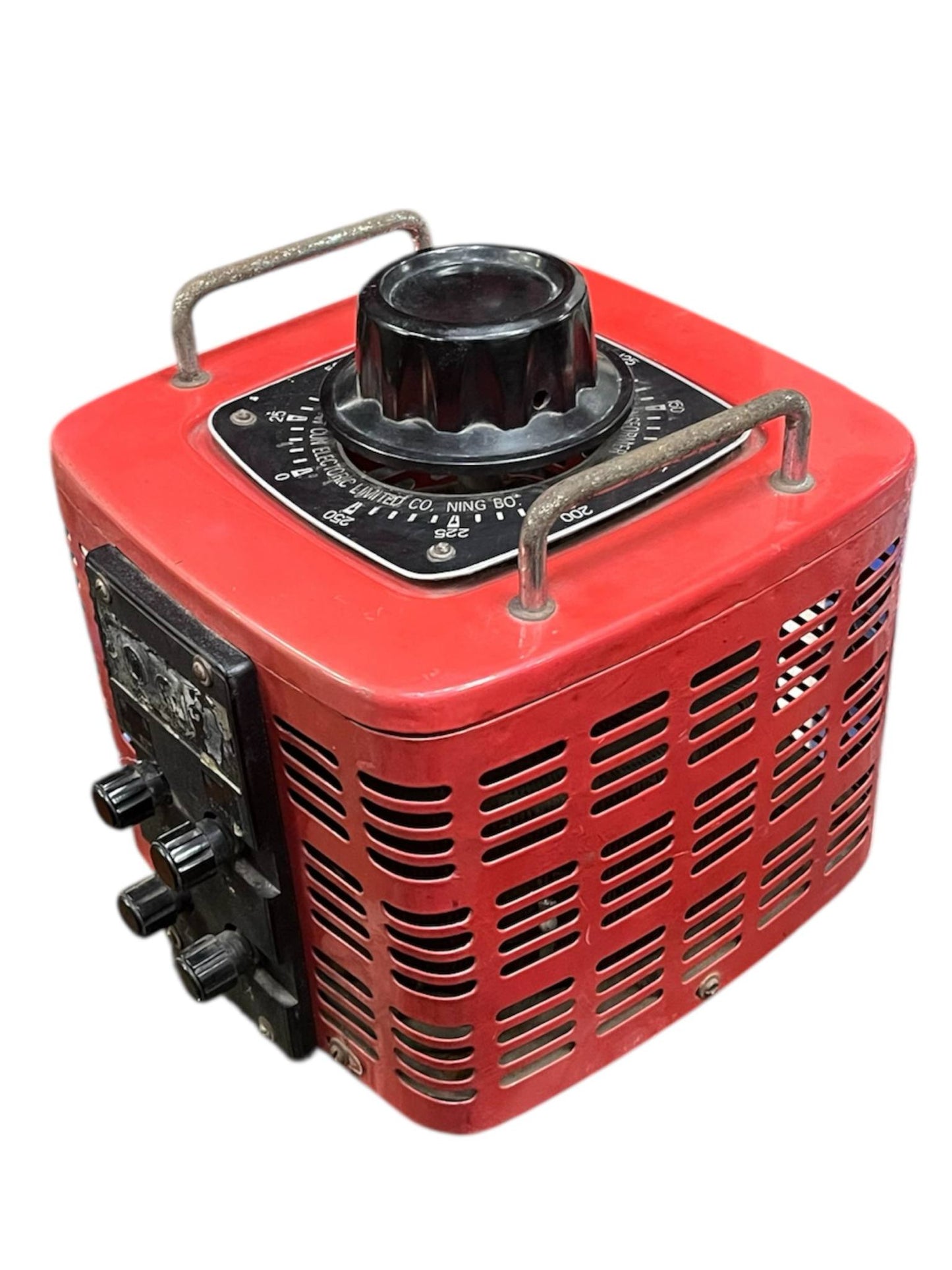 Stavol 5000W variac transformer in red with black control knob and metal handles for electrical testing