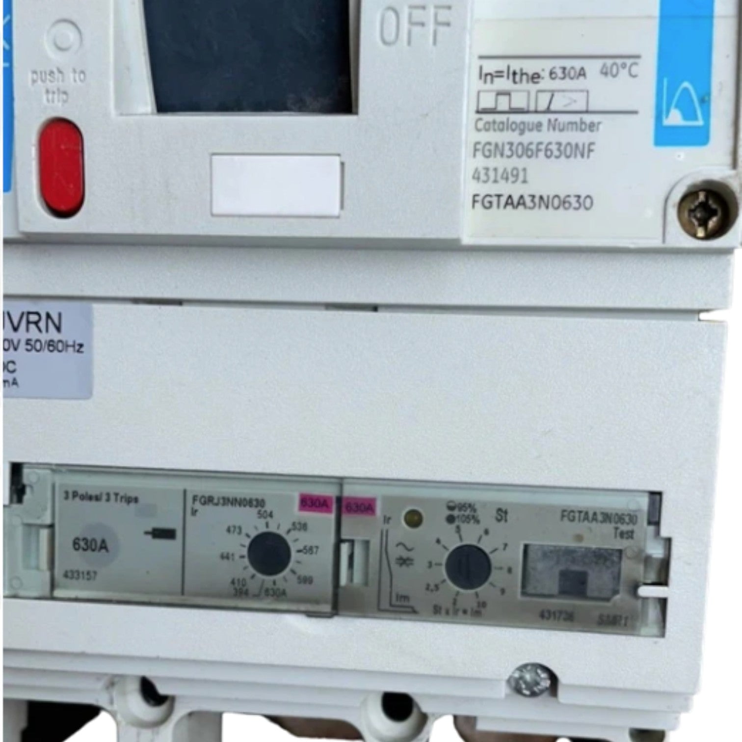 Electrical panel with various meters and labels on a white background