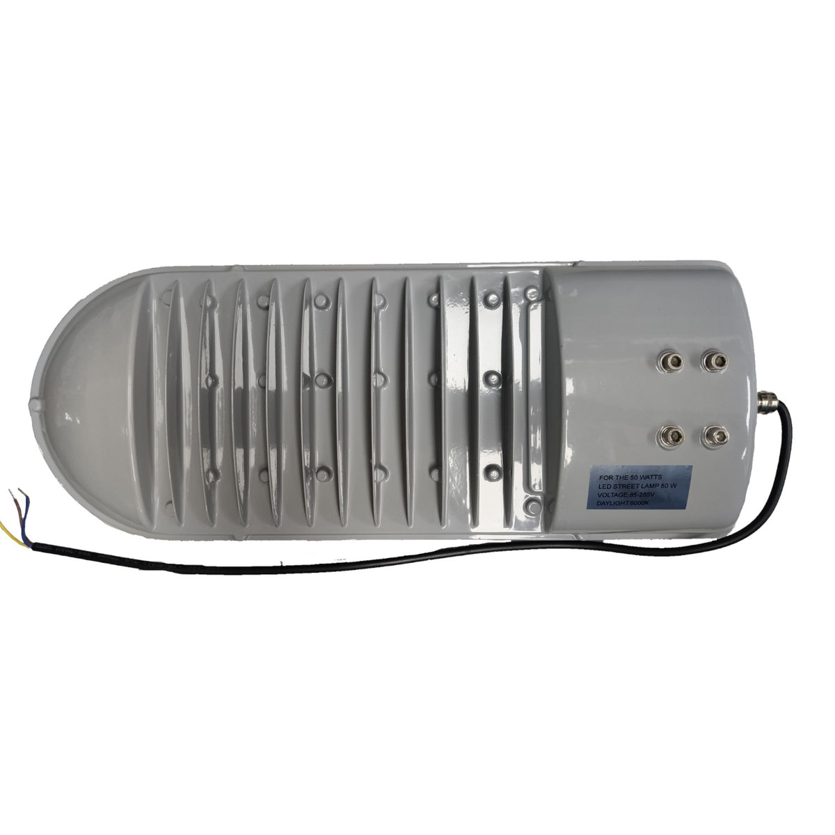 Gray industrial device with ribbed surface and visible wiring on a white background