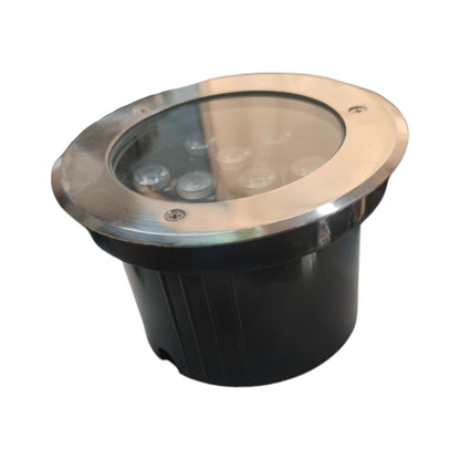 Round black outdoor light fixture with metallic top on a white background