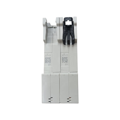 A pair of industrial electrical terminal blocks, one in light gray and one in black, shown vertically on a plain white background.