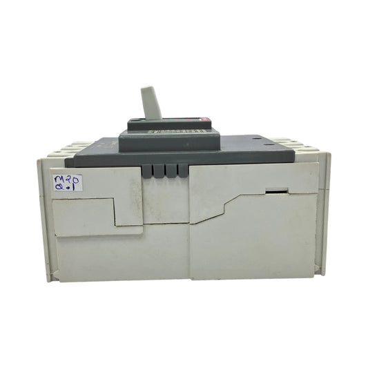 A vintage beige and dark gray paper shredder or document processor, photographed from the front against a plain white background. A handwritten price tag is attached to the left side.