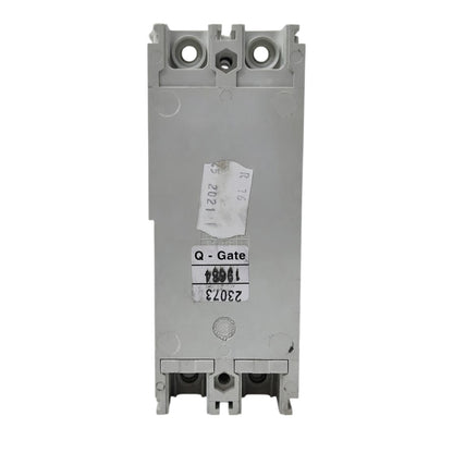 A gray plastic electrical contactor or relay component with terminal holes at the top and bottom, featuring a white paper label that reads 'Q - Gate' and numbers '23073'.