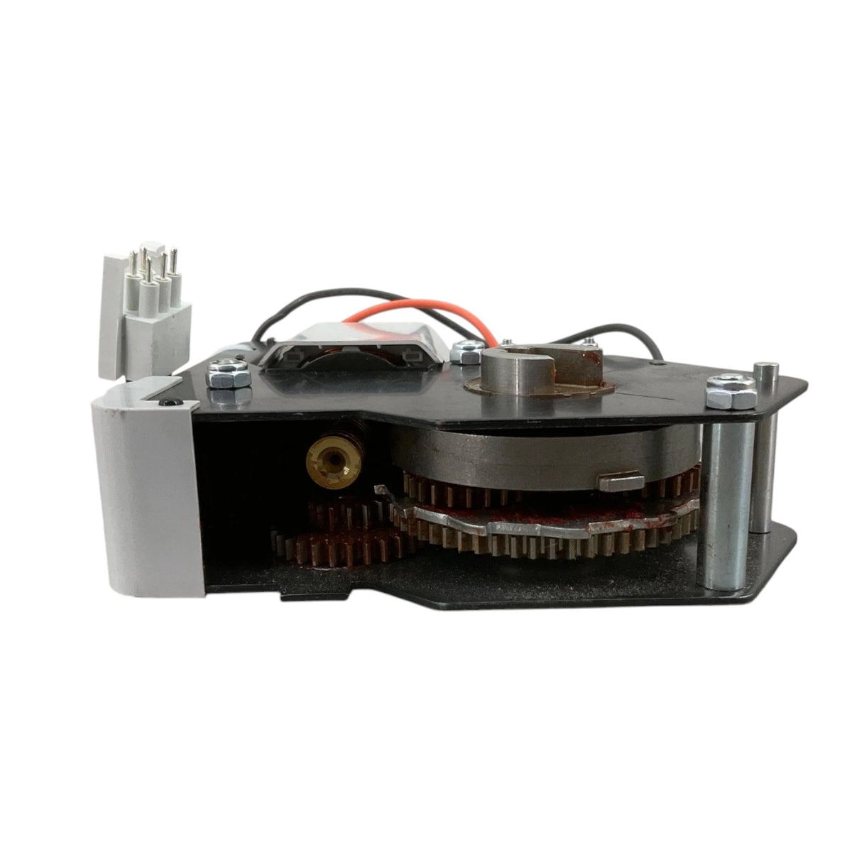 A heavy-duty industrial contactor relay with a gray plastic housing, featuring terminal blocks at the top and bottom, a worn paper label with numbers, and a small sticker near the bottom, shown against a plain white background.