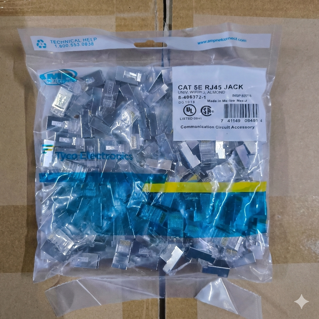 Packaged RJ45 connectors with Tago Electronics branding on a cardboard background AMP CAT5e RJ45 Connector Shielded Metal (100PCS) Per Order Electx Electrical Supply