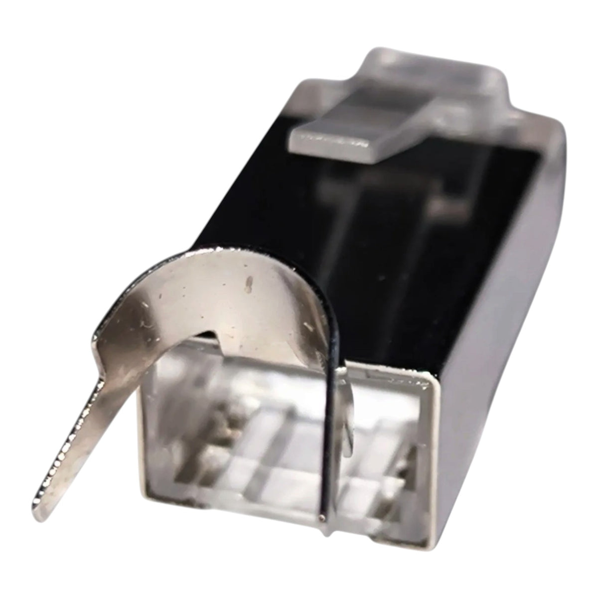 A close-up of a small electronic component with a transparent plastic housing, black internal area, and a silver metal tab extending from the front, shown on a plain white background.