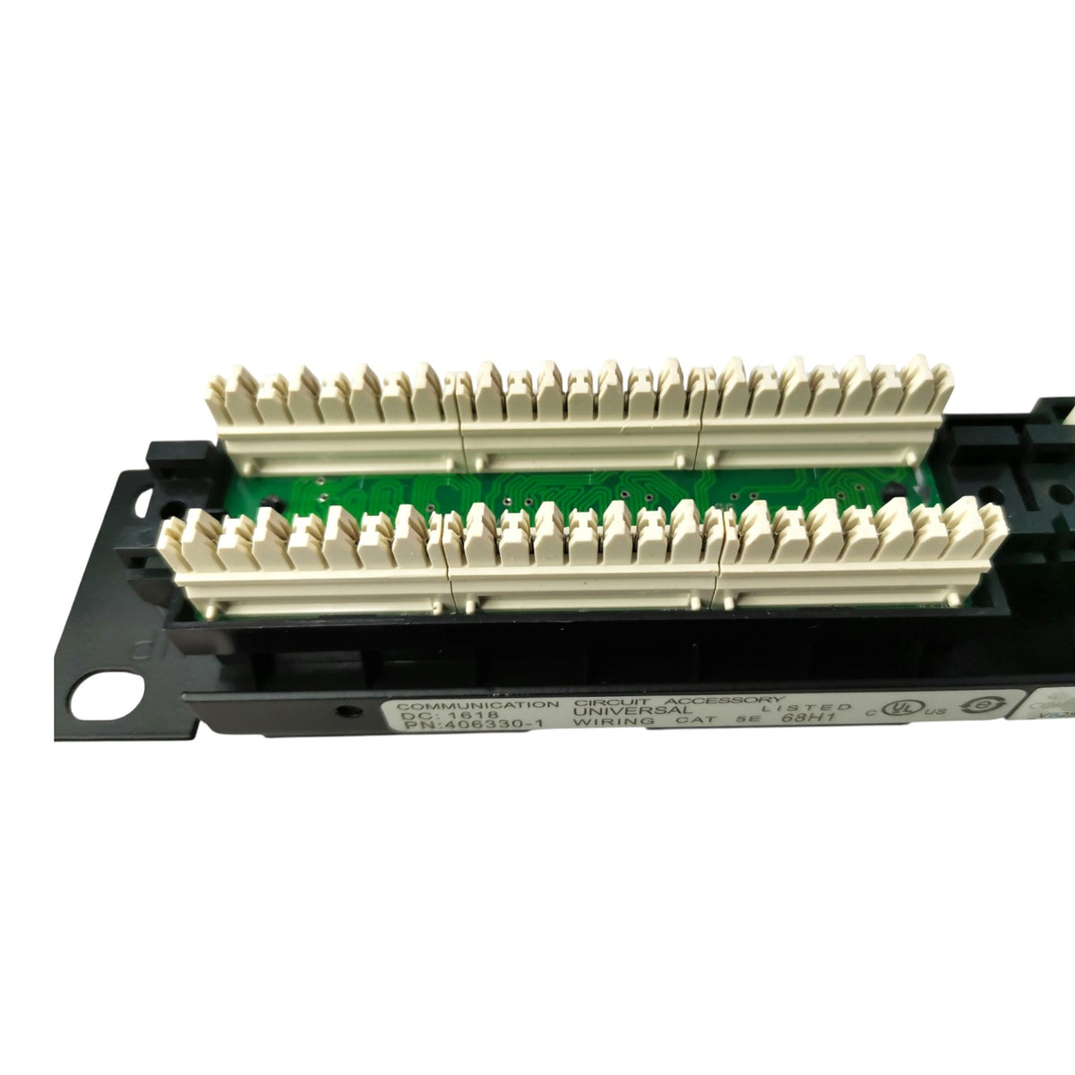 A black automotive electronic control module with multiple beige terminal connectors arranged in two rows over a green circuit board, shown on a plain white background.
