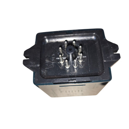 Black rectangular electrical connector with metallic pins on a white background