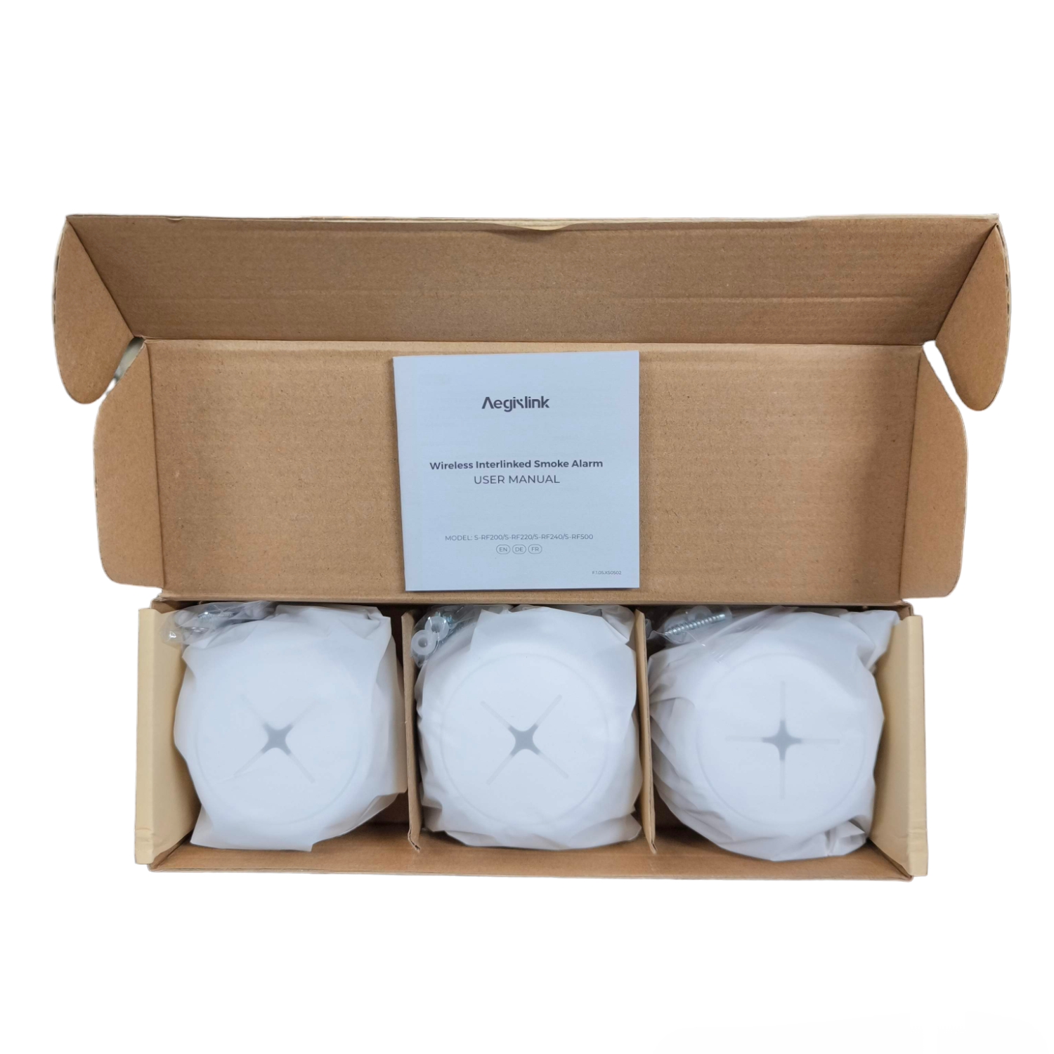 Aegislink wireless interlinked smoke alarm set with three alarms in an open cardboard box