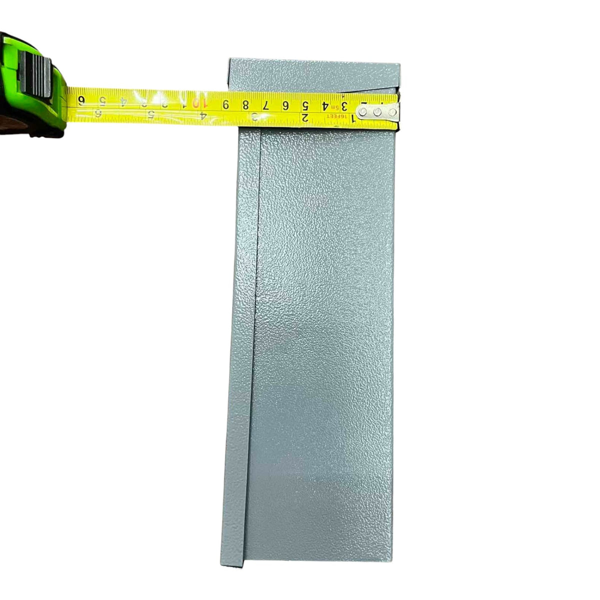 Metallic sheet with a tape measure for scale on a white background