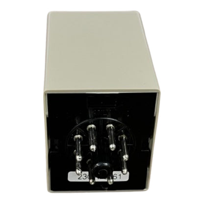 Rectangular electronic component with metallic contacts on a white background