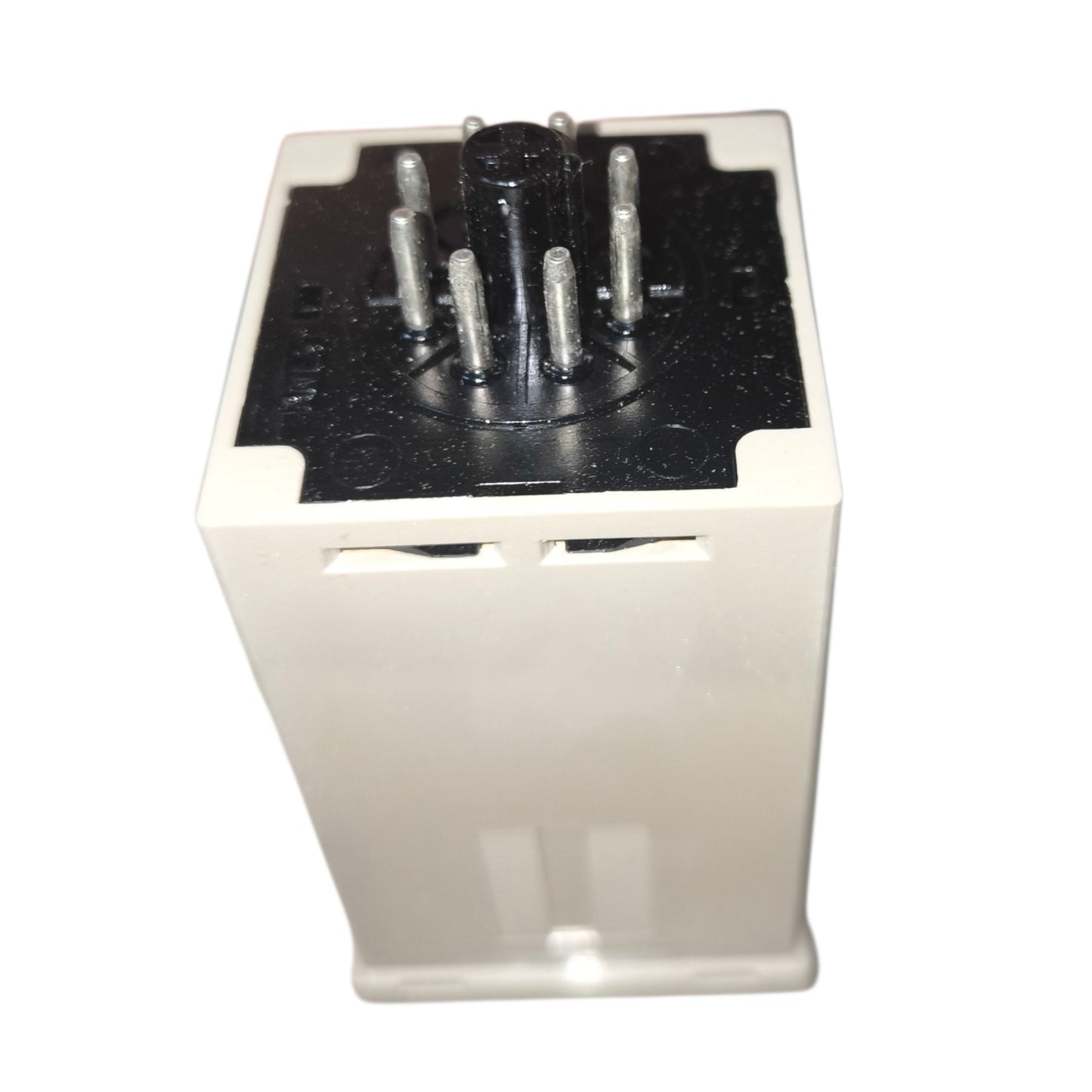 Electrical component with metallic contacts on a white background