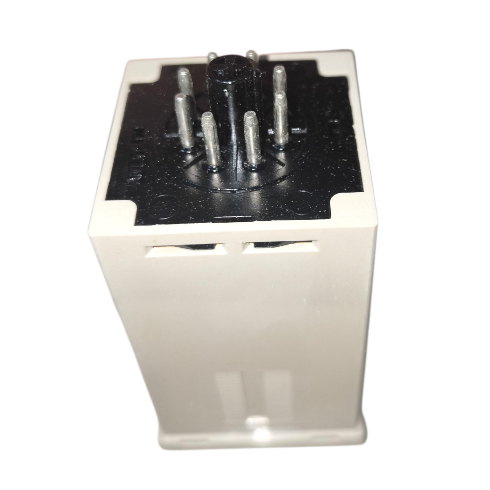 Electrical component with metallic contacts on a white background