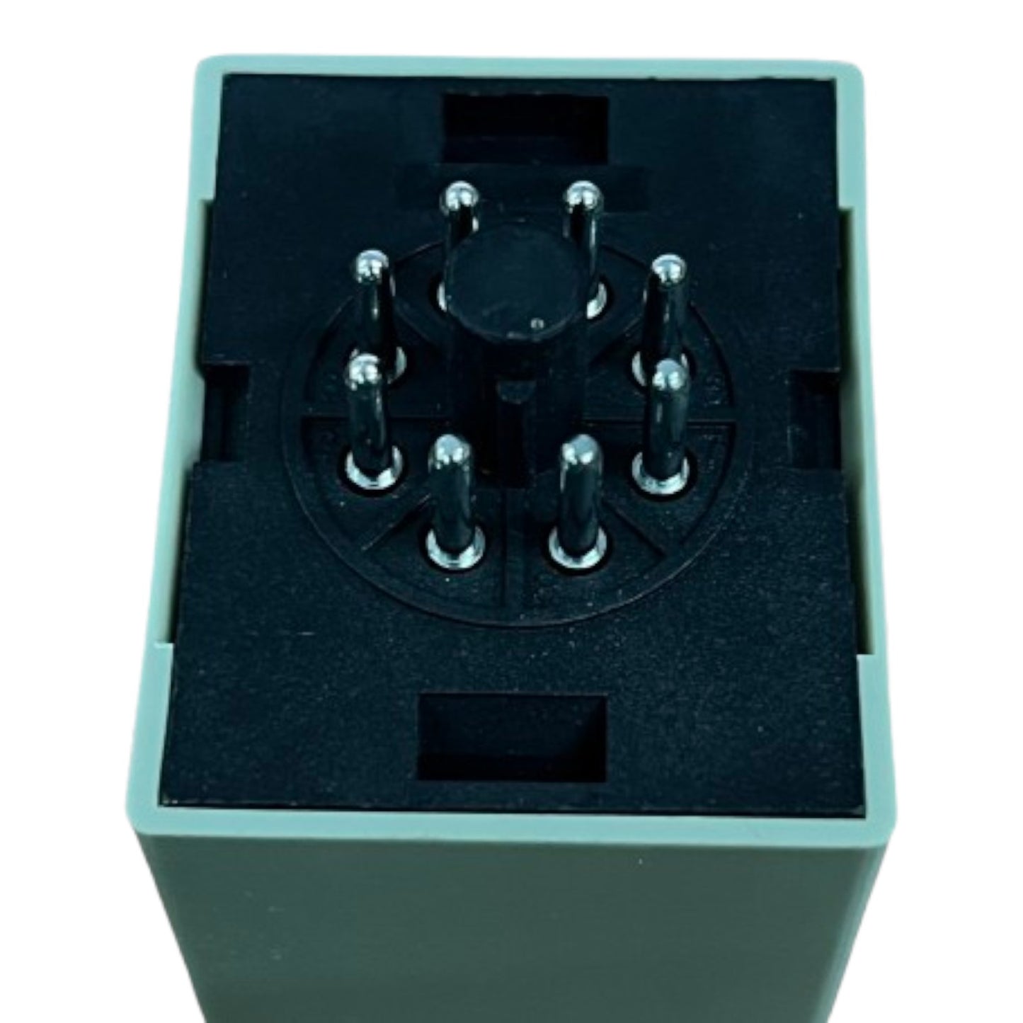 Electrical component with multiple pins on a black background