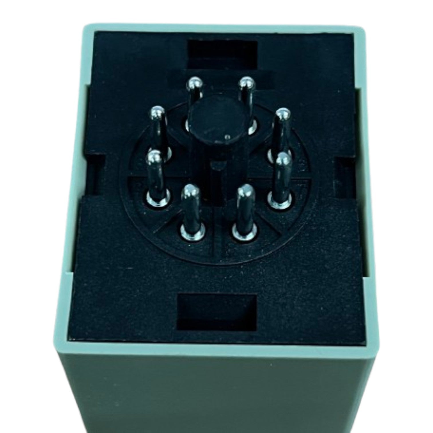 Electrical component with multiple pins on a black background