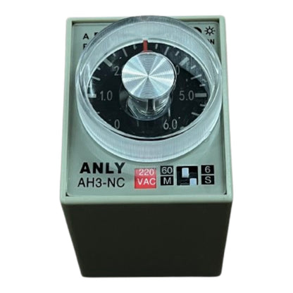 Mechanical timer with a dial and labeled specifications on a white background