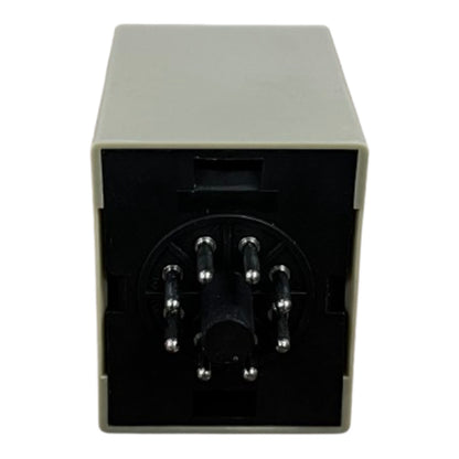 Black and beige electronic device with multiple ports on a white background