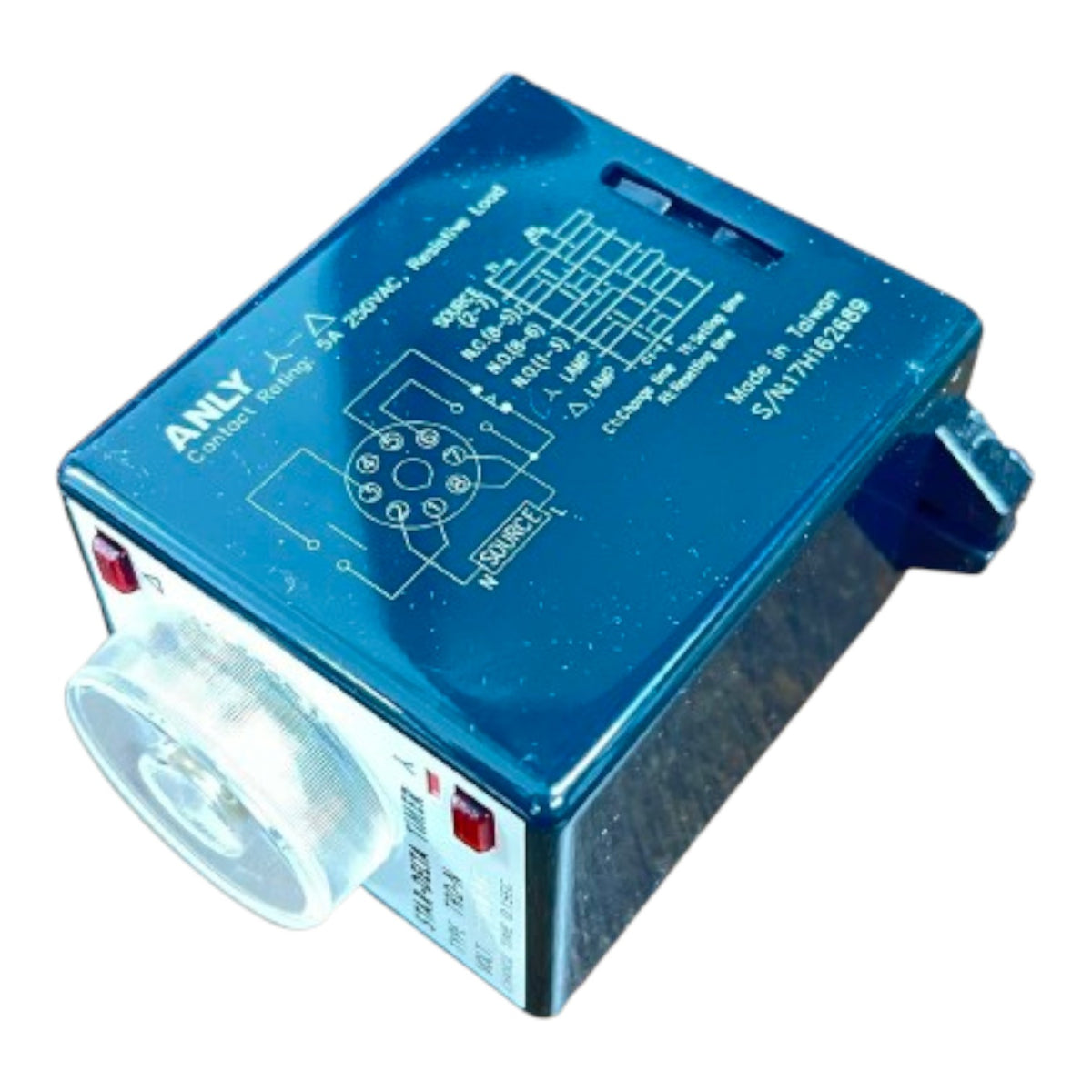 Blue electronic control module with technical drawings on a white background