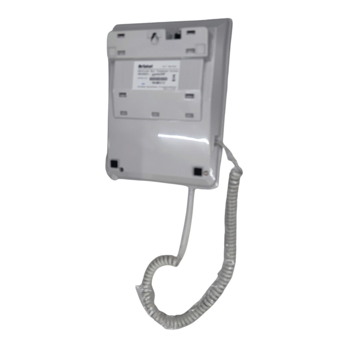 A wall-mounted white telephone receiver with a coiled cord, shown against a plain white background.
