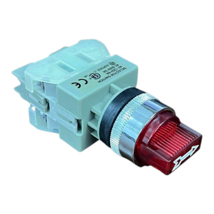A marine navigation signal light with a light blue plastic housing, a black and silver adjustment ring, and a red ribbed lens.