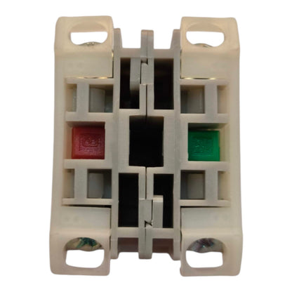 A double-pole electrical terminal block connector with a beige plastic housing, featuring red and green colored terminal blocks in the center, isolated on a white background.