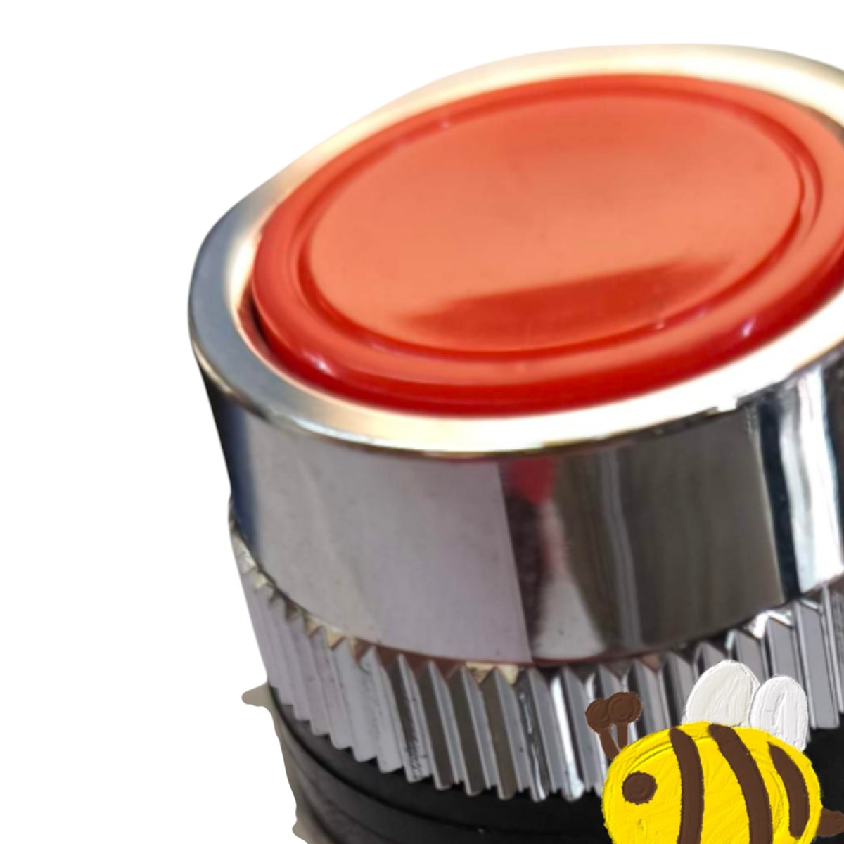 A close-up of a round industrial push button with a red plastic top and a shiny silver metal body, shown on a white background with a small bee graphic in the lower right corner.