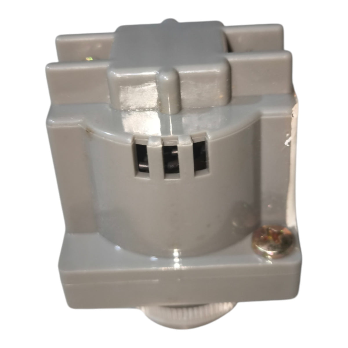 A gray plastic electrical component or sensor module with a ribbed cylindrical base, ventilation slots, and a small screw fastener, shown on a plain white background.