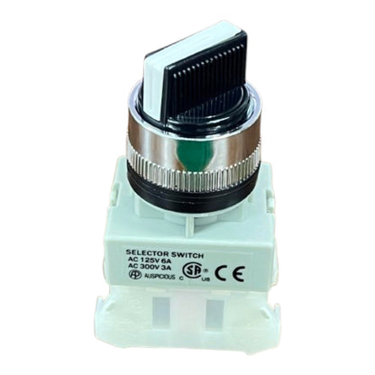 A plastic and metal selector switch component with a white base, a silver and black knob, and printed technical specifications on the front.