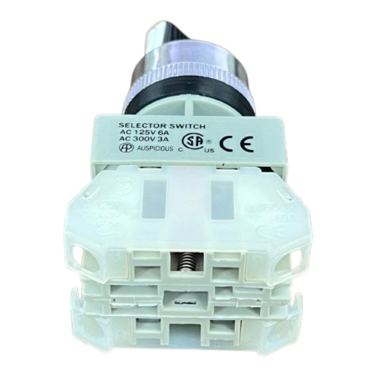A white plastic industrial selector switch with a black and silver knob, featuring printed specifications and certification logos on the top cover.